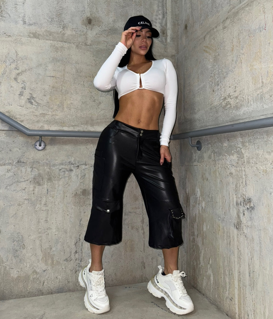 Bermuda black effect glossy studded pockets and button