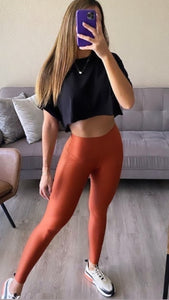 Terracotta color leggings effect leather basic